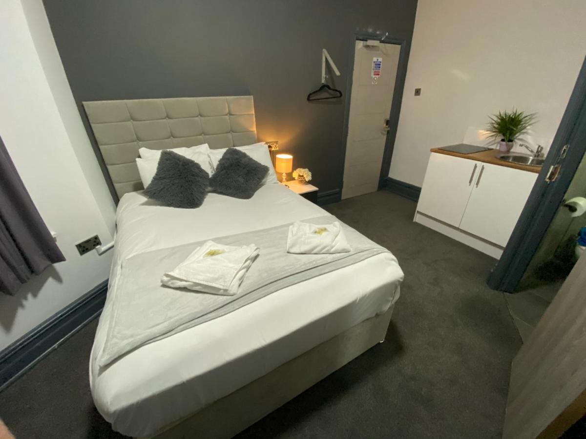 Park City Suites Hotel Manchester Buitenkant foto